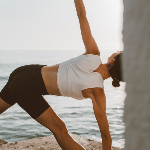 Person stretching gently, showing flexibility and well-being.